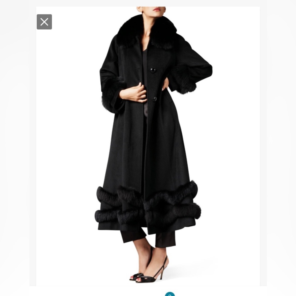 Fabulous cashmere coat with fox trim. Sold out everywhere. A head turner.